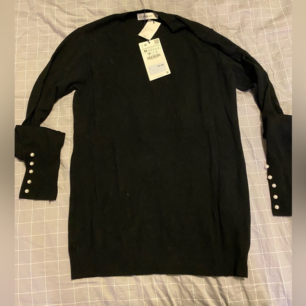 Zara black sweater with Pearl details on sleeves. Size medium. New with tags